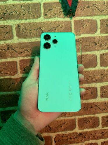 optimal telefon kredit: Xiaomi Redmi 12, 128 ГБ, цвет - Синий, 
 Сенсорный, Отпечаток пальца, Беспроводная зарядка