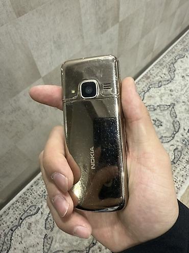 нокиа 301: Кнопочный телефон Nokia 6700 в золотистом корпусе — 2