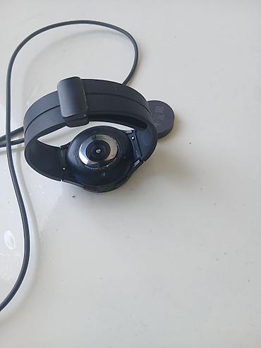 galaxy watch fe: Samsung Galaxy Watch (qara), maqnitli USB‑C simli şarj cihazı ilə — 5