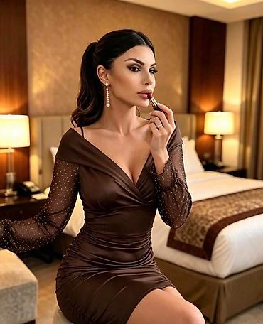 broj 36: Elegantna čokoladno-braon haljina sa prozirnim rukavima Haljina 2.500 — 2
