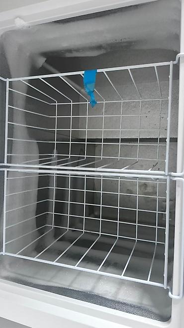 держатели для фена: Морозильный ларь SNOWCAP, объем 145 л. Особенности: - Тип — 2