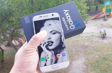магнитола на андроиде: Samsung Galaxy S7, Колдонулган, 128 ГБ, түсү - Күмүш, 2 SIM, eSIM