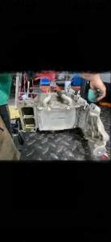 punjac akumulatora: VW GOLF 7 DWLOVI USISNA GRANA INTERKULER 04L129760 | audi vw delovi — 1