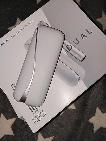 Şəxsi əşyalar: Lil SOLID DUAL (IQOS təqdimatı) – tütün isidən cihaz Qutu tərkibi: - — 3