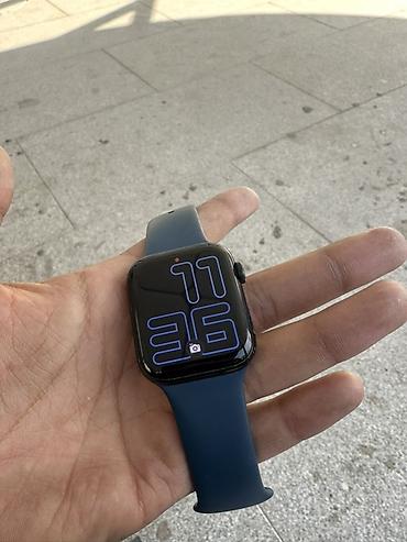 Смарт‑часы Apple Watch (алюминиевый корпус) с синим спортивным