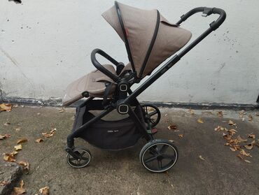 детские коляски для новорожденных: Коляска, цвет - Коричневый, Б/у