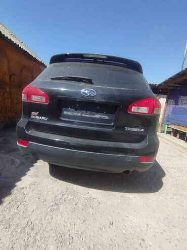 скупка авто в любом состоянии: Черный универсал Subaru Outback, оснащенный рейлингами на крыше и