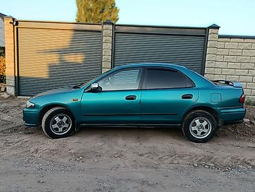 мапет матор: Mazda Familia: 1997 г., 1.6 л, Автомат, Бензин, Седан — 4