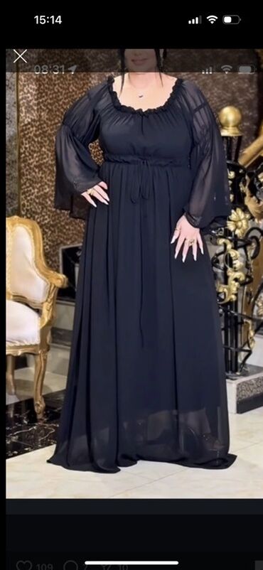 qaqa stili: Qara rəngli, uzun maxi paltar - Stil: romantik/klassik siluet, axıcı