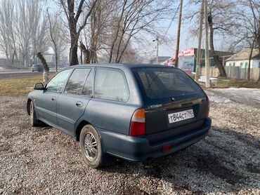 Mitsubishi: Mitsubishi Lancer: 1995 г., 1.6 л, Механика, Бензин, Универсал