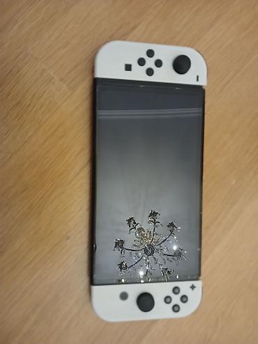 nintendo switch lite: Nintendo Switch komplekti - Konsol: Nintendo Switch (arxa hissə — 7