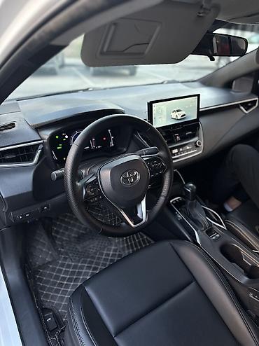 voxy noah: Toyota Corolla: 2023 г., 1.8 л, Вариатор, Гибрид, Седан — 9