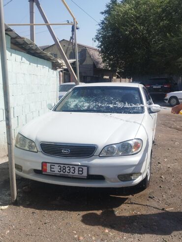 диски ниссан сефиро: Белый седан Nissan (праворульный), номер E 3833 B, кузов