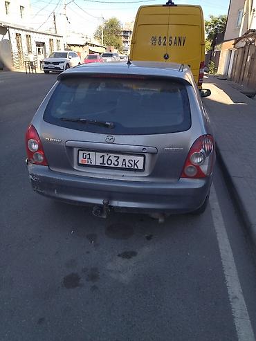 mazda 2000: Mazda 323: 2002 г., 1.6 л, Механика, Бензин, Универсал — 1