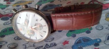 Tissot 1853 kişi qol saatı - Klassik dizaynlı, dairəvi gümüşü rəngli