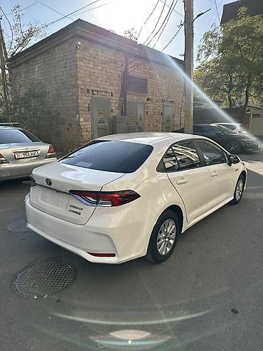лимузин цена: Toyota Corolla: 2022 г., 1.8 л, Автомат, Гибрид, Седан — 5