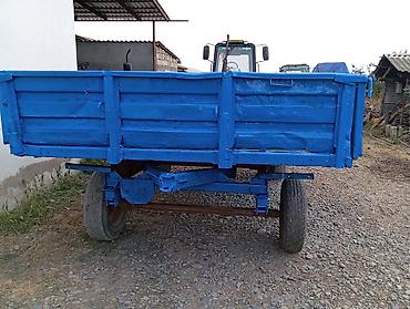 en ucuz traktörler: Traktor qoşqusu – 2 oxlu, mavi rəngdə metal bortlu. - Ümumi təyinatlı — 1