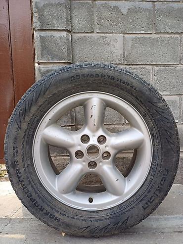 Комплект колес: легкосплавные диски 18" с шинами Nokian Hakkapeliitta