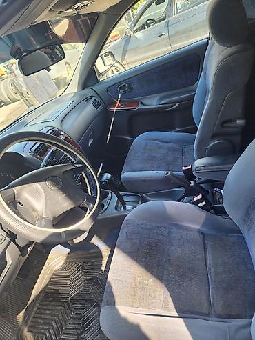 exeed lx: Mazda 626: 1999 г., 1.8 л, Автомат, Бензин, Седан — 6