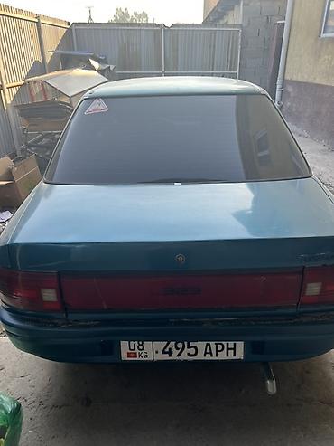 мазда 323 машина: Mazda 323: 1991 г., Механика, Бензин, Седан — 2