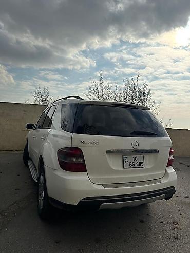 bmw e 38: Mercedes-Benz ML 350: 3.5 l | 2006 il Ofrouder/SUV — 1