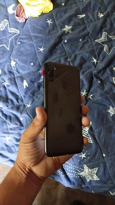 samsung es: Samsung Galaxy A11, 64 GB, rəng - Qara, Barmaq izi — 1