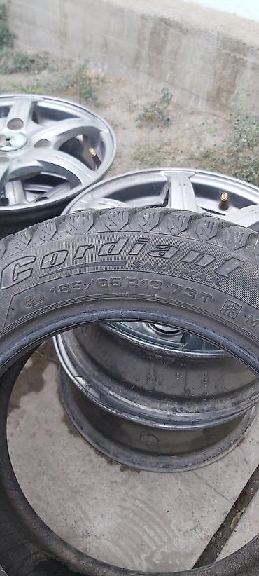 зимный: Cordiant Snow-Max, зимние шипованные шины. - Размер: 155/65 R13 - — 1