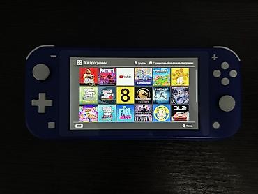nintendo: Nintendo Switch Lite (mavi) – oyun konsolu. Konsol cox seliqeli — 1