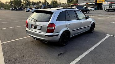 bmb e36: Mazda 323: 1999 г., 1.6 л, Механика, Бензин, Универсал — 5