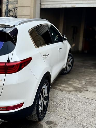 Kia: Kia Sportage – kompakt krossover - Korpus rəngi: ağ - Kuzov: 5 qapılı — 7