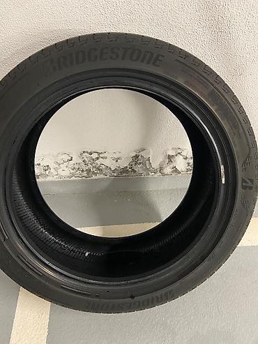 245 45 18: İşlənmiş Şin Bridgestone 235 / R 18 — 4
