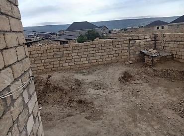 oguz ev: Satışda: həyətyanı sahəsi və tikilisi olan torpaq Xüsusiyyətlər: - — 3