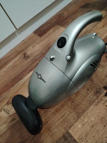 Ručni usisivači: Ručni električni usisivač – Candy Star (mrežni, sa dodacima) Opis: - — 2