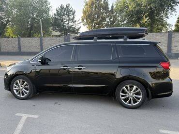женил жук ташуучу унаалар: Представляем минивэн черного цвета, оснащенный багажником на крыше для