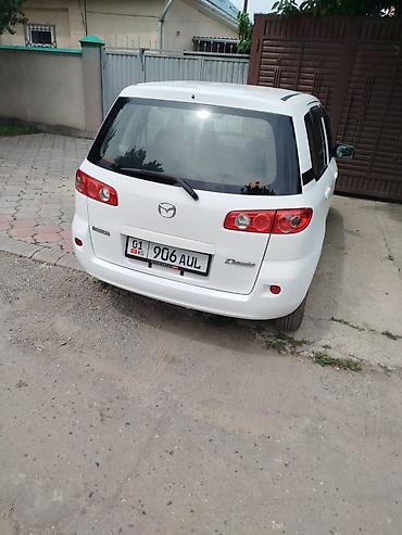 bid e5: Mazda 2: 2006 г. — 2