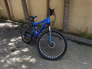 велосипед baol: Dağ velosipedi – mavi rəngli, ön amortizatorlu və arxa yaylı asqılı