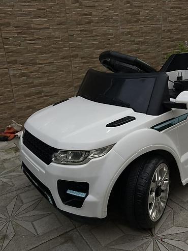 oyuncaq kamaz type 1: Uşaq elektrik maşını – ağ rəng, SUV dizaynı Xüsusiyyətlər: - — 4