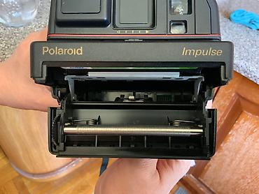 kingdom come: Polaroid 600 İmpulse- fotokamerası. İstehsalçı ölkə: United Kingdom. 1 — 6
