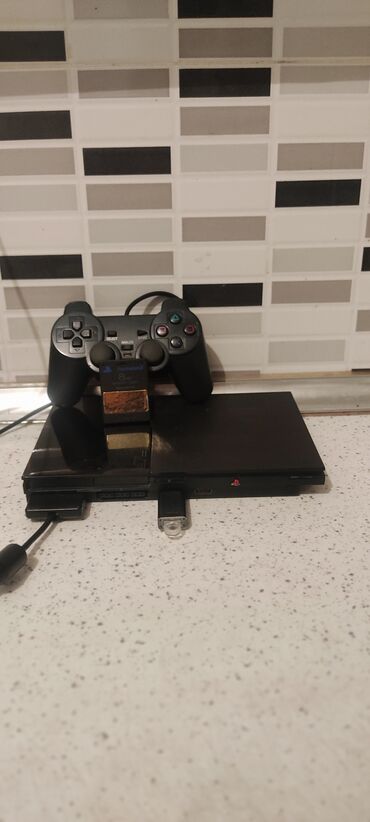 pleşteşin: Ps2 satılır! Qizma donma yoxdur. Üstünde 2 joystick verilir. flaş