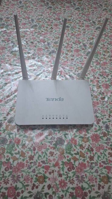 gpon modem baku: Ideal vəziyyətdedir 1 ilindir tenda modemidir 3 antenali