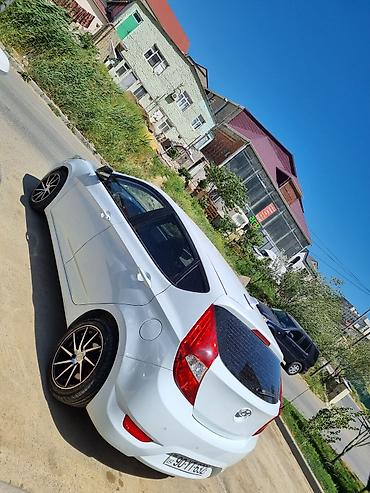 accent duman: Hyundai Accent: 1.6 l | 2017 il Hetçbek — 1