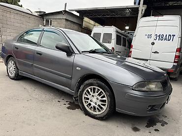 харизма: Mitsubishi Carisma: 2003 г., Седан — 4