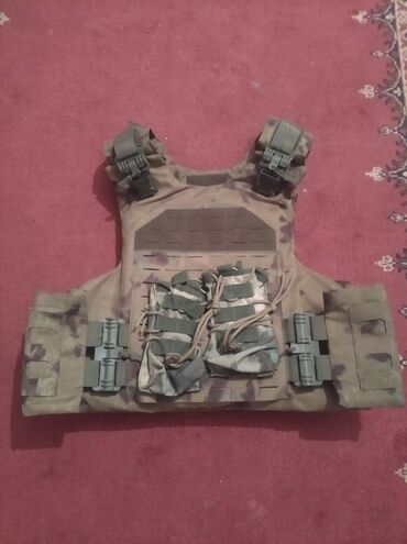 военные жилеты: Тактический жилет в расцветке мультикам с системой крепления MOLLE