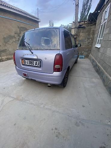 Daihatsu: Daihatsu Cuore: 2003 г., 0.8 л, Механика, Бензин, Хэтчбэк — 5