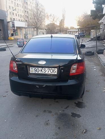 yan güzgülər s: Kia Rio: 1.4 l | 2010 il Sedan — 6
