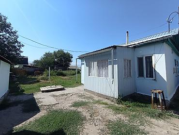 горах: Продаётся дом в городе Токмок. Дом состоит из 4 комнат и прихожей. В — 2