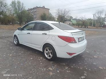 Унаа: Hyundai Solaris: 2015 г., 1.4 л, Кол менен иштөөчү, Бензин, Седан — 7