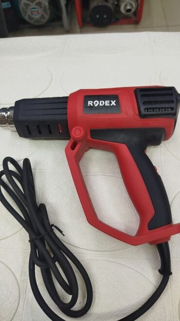 тепловая электропушка: Строительный фен Rodex с горячим воздухом, выполненный в красно-черном