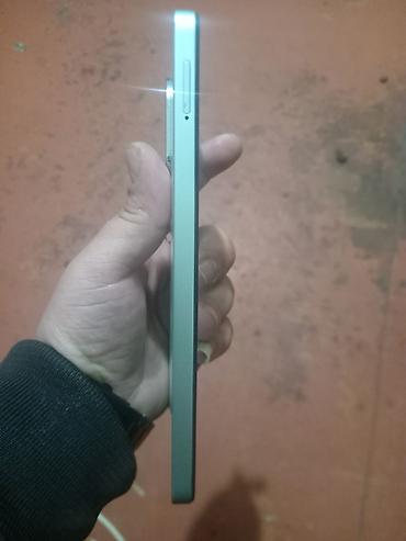 mini 6 ipad: Smartfon – 128 GB yaddaş, su damcısı formalı ön kamera kəsiyi olan tam — 1