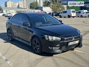 Mitsubishi: Mitsubishi Lancer Evolution: 2009 г., 1.8 л, Робот, Бензин, Седан